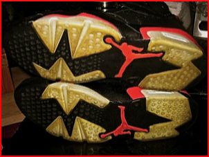 Yellowed sports shoe soles before restoration by SEA GLOW™ 